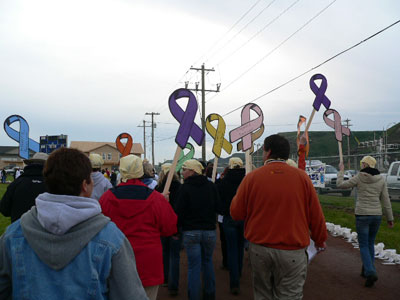 We fight all cancers - participants with ribbons in Drumheller