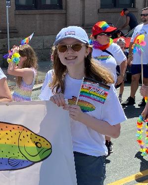 This photo was taken at the 2023 St Johns Pride Parade. I was able to join the parade and walk with DFO!