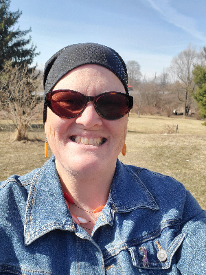 March 2024, after my first radiation treatment!!  It was so glorious to feel the sun on my  face and to start to feel like myself again!!